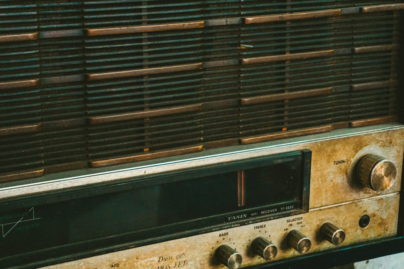 An old radio sitting on top of a table